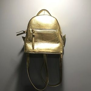 Forever 21 mini gold backpack